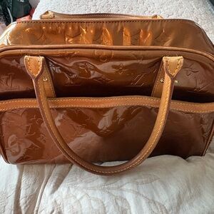 Louis Vuitton see pics for call outs and date code.